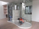 Thi công vách kính cong cường lực quận Tân Phú